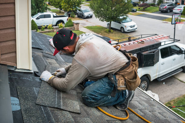 Professional Roofing technician working in York Beach, ME